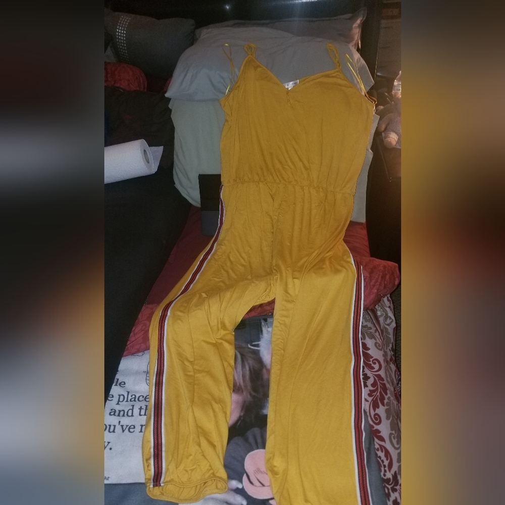 This jumpsuit was worn once its very comfortable so soft u will love it